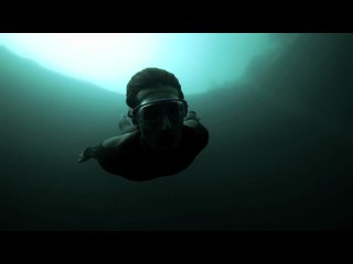 guillaume nery base jumping at dean s blue hole, filmed on breath hold by julie gautier